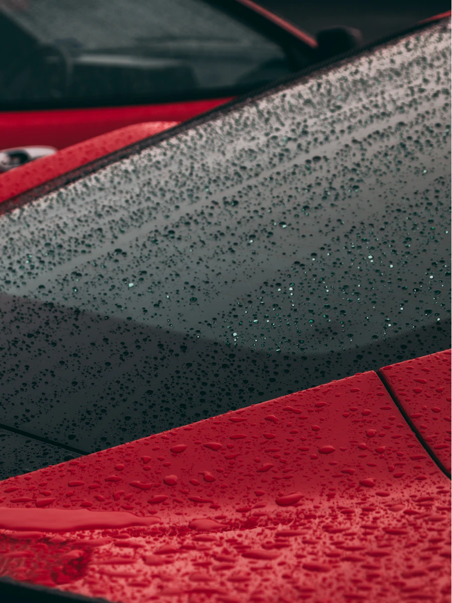 Glossy sports car after ceramic coating and exterior detailing